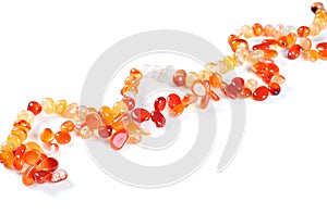 Necklace made of semiprecious stones, on white background; photo