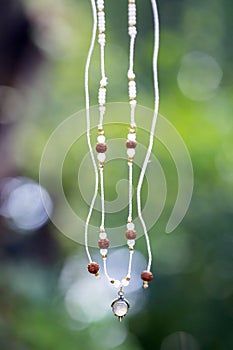 Necklace on natural background with moonstone