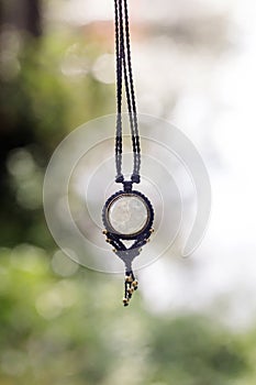 necklace on natural background with white moonstone