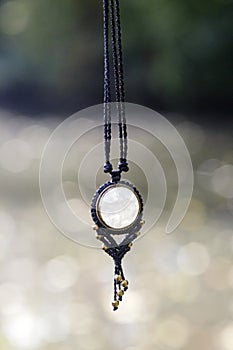 necklace on natural background with white moonstone