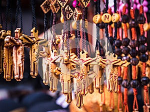 Necklaces depicting caricatures of the Lord Jesus on the cross