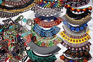 Necklaces made of beads, handcraft and souvenir from Ecuador photo