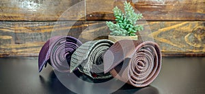 neckties on the table on wooden background. classic style