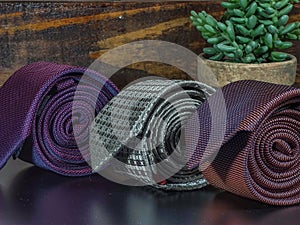 neckties on the table on wooden background. classic style