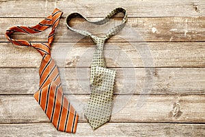 Neckties on wooden background. Top view. Father`s Day.