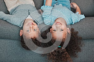 Need a different perspective. two little siblings spending time together at home.