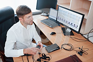 Need some things to be done before we started. Polygraph examiner works in the office with his lie detector`s equipment