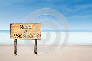 Need a vacation sign on beach