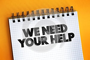 We Need Your Help text quote on notepad, concept background