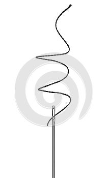 Needle with a black thread close up isolated on white