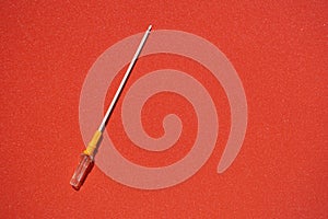 Needle decompression during pneumothorax, emergency medical help. on a red background