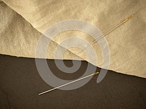 needle and natural linen texture background