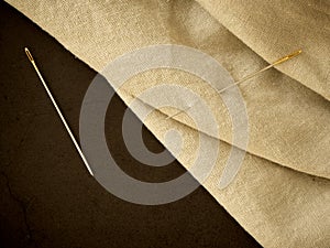 needle and natural linen texture background