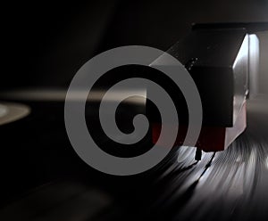 The needle of an record player in close up view