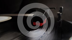 The needle of an record player in close up view