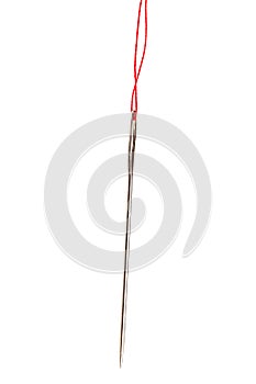 Needle with red thread isolated on white