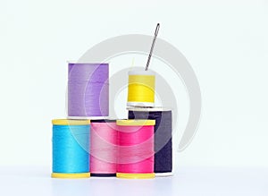 Needle and Spools of Thread