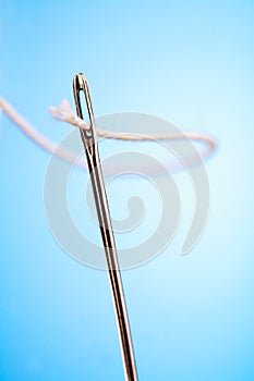Needle with a thread