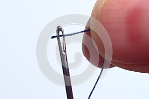 Needle with thread