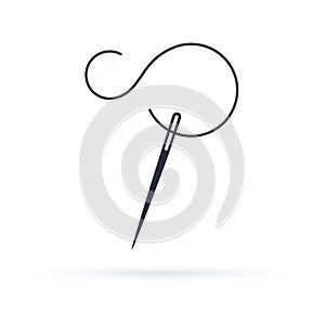 Needle with thread vector icon. Sewing concept symbol or design element photo