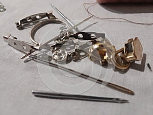 needles, safety pins and thread for crafts