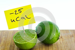 Negative-calories food, limes on a cutting board