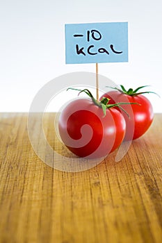 Negative-calories food, tomato on a cutting board