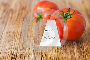 Negative-calories food, tomatoes on a cutting board