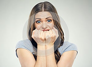 Negative emotion on face portrait of young woman.