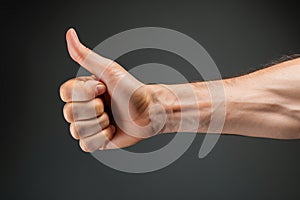 Negative expression Hand showing thumb down, disapproval, rejection, dislike gesture
