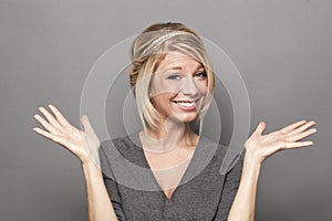 Negligence concept for thrilled young blond woman photo