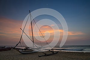 Negombo Beach at sunset in Sri Lanka photo