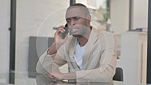 Negotiating African American Man Talking on phone