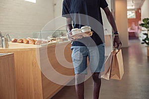 Black man working deliveryman in covid-19 pandemic photo