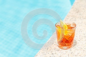 Negroni cocktail near a pool at the resort bar or suite patio