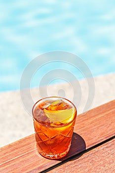 Negroni cocktail near a pool at the resort bar or suite patio