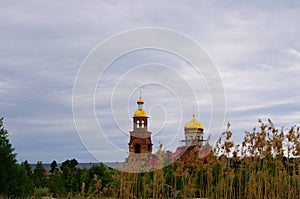 neighborhood of a small town view of the church with domes autumn landscape