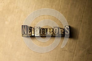NEIGHBORS - close-up of grungy vintage typeset word on metal backdrop