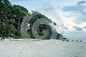 Neil Island beach and blue sky with white clouds