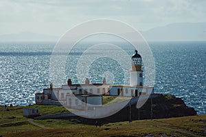 Neist Point island lighthouse on Isle of Skye in Scotland, UK