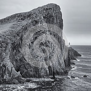 Neist point lighthouse on the Island of Skye in black and white. Scotland, UK