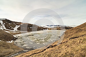 Il lago Scaffaiolo ghiacciato a inizio anno photo