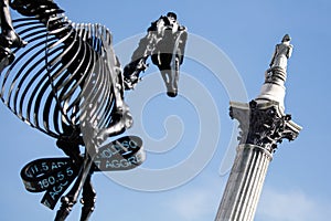 Nelsons Column and Dinosaur sculpture photo