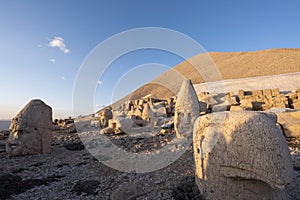 Nemrut ancient ruins statue heads on top of the mountain snowy day blue sky