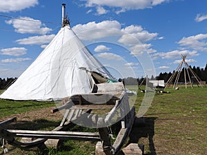 Nenets herders hut for the summer on a meadow, on a clear day