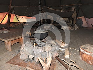 Nenets plague house, built with a large number of poles in the center of the shaft, the interior of the plague, decoration