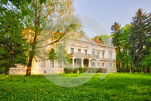 Neo classicist manor house in the park in Nova Ves nad Zitavou village photo