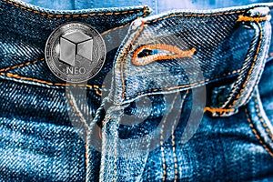 Neo coin instead of buttons on jeans.