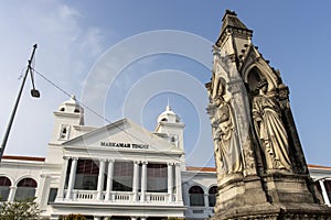 Neo gothic memorial statue and the Supreme Court Building at Light Street (Lebuh Light) in the