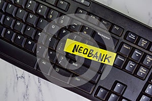 Neobank write on sticky notes isolated on Wooden Table